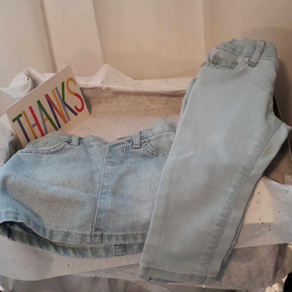 A jean skirt with a pair of jean pants skinny